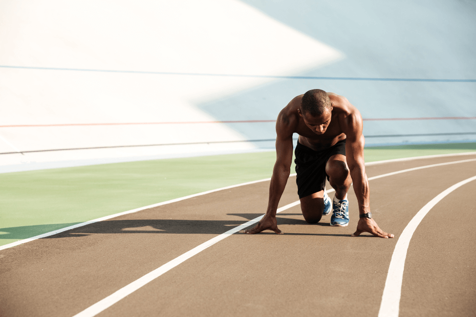 Athlete preparing to run on a track